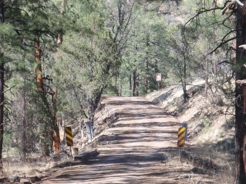 Bridge and sign for our Campsite.